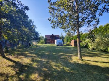 Sprzedam dom z bali na dużej działce w okolicy jeziora - Na sprzedaż  dom  : Brzeźniak